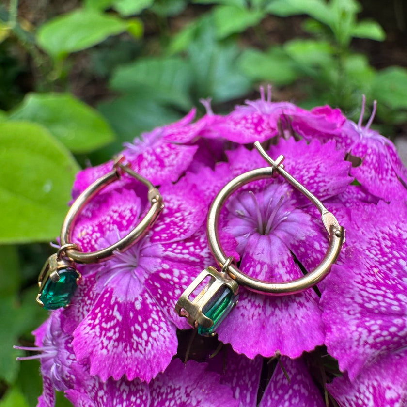 DRIPPING IN EMERALDS 14K HUGGIE HOOPS